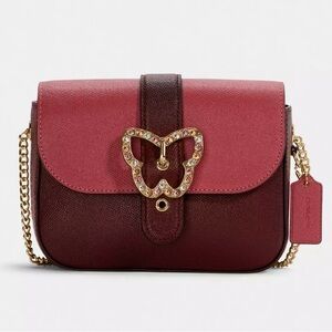 COACH Pink and Brown Crossbody Bag with Jeweled Butterfly Accent
